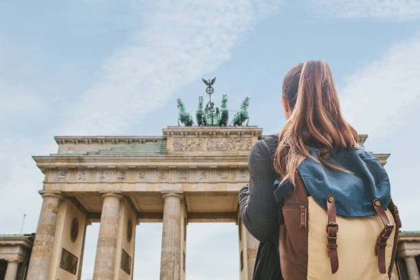 International student in Germany near Brandenburg Gate planning to study abroad